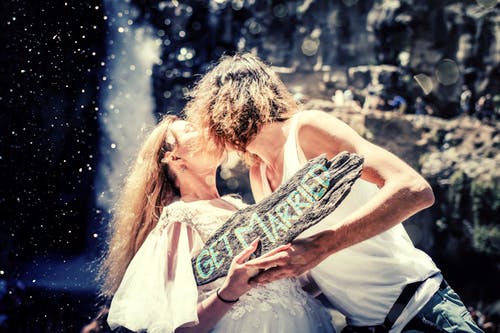 Elope under a waterfall